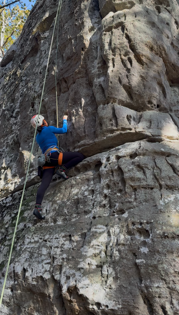 Woman climbing at Black Mountain in Crossville, TN
